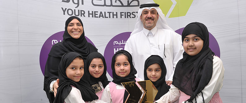 tudents of Moza Bint Mohammed Independent Elementary School for Girls celebrate winning Project Greenhouse with school principal Shaikha Al Mansoor, and Hassan Al-Mohamedi, Director of Public Relations and the Communications Department at the Ministry of Education and Higher Education.